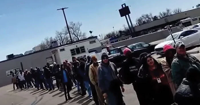 homeless persons lining up in Springs Rescue Mission in Colorado