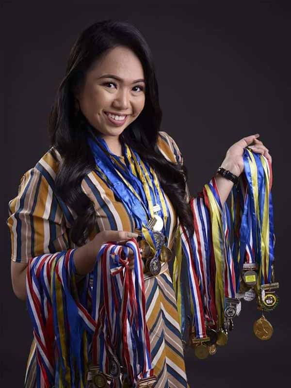 Crystalle with her medals