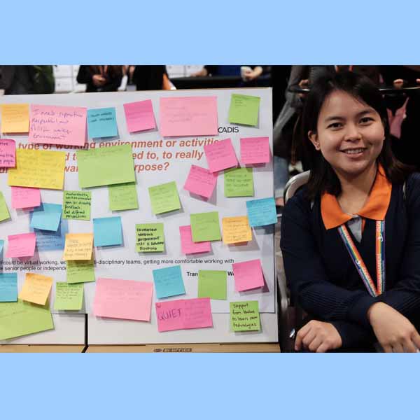 Kathreen Louise Del Rosario with lecture sticky notes