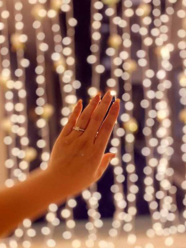 Bianca Yanga showing her engagement ring