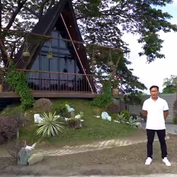 Gbong Suniga Jr. and his treehouse.