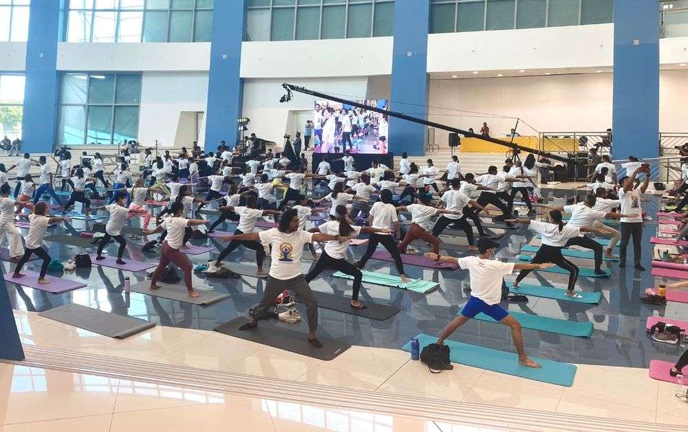 Participants do the Yogasana at the 8th International Day of Yoga