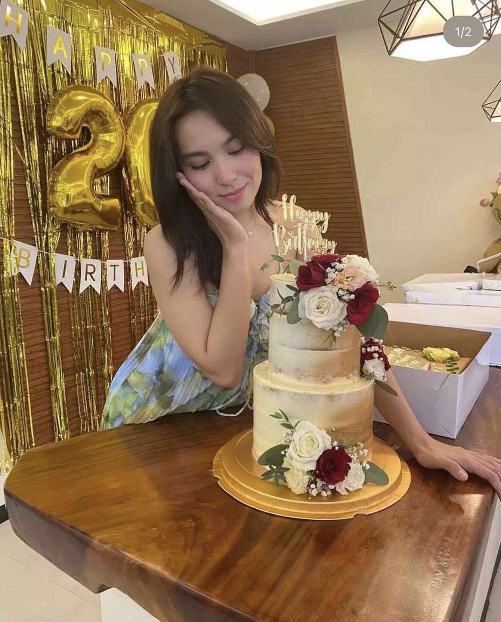 Kyline Alcantara strikes a pose beside her birthday cake.