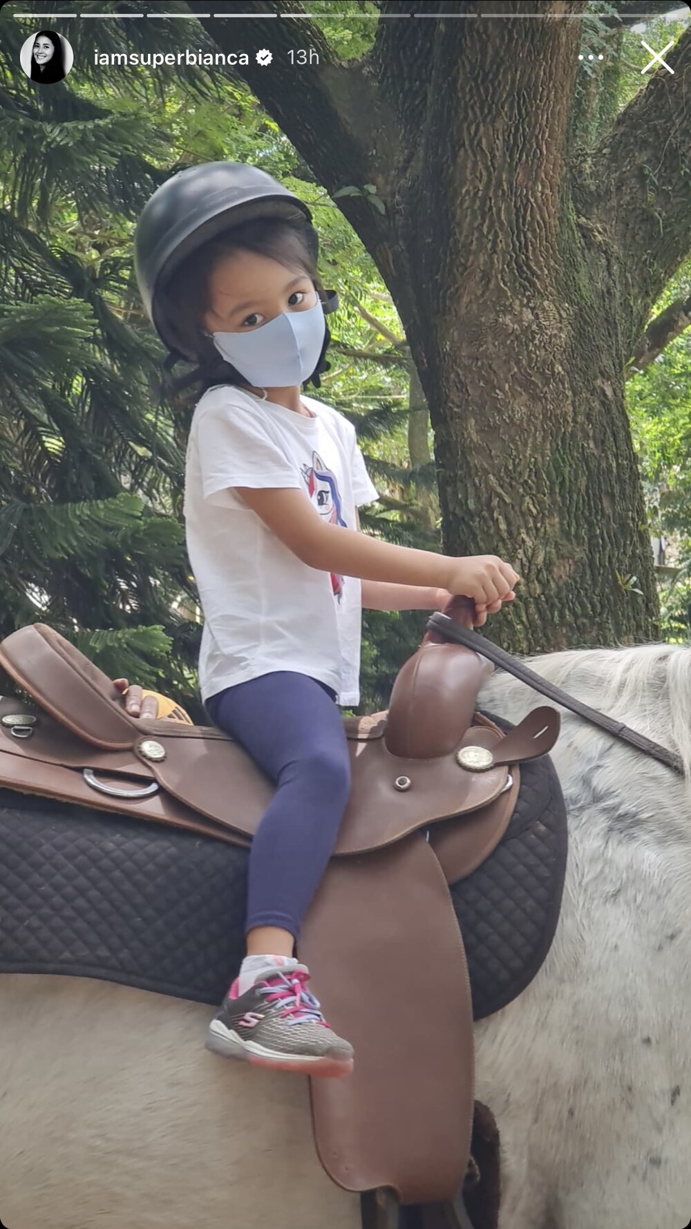 Lucia Martine Intal's younger sister Carmen Eliana Intal goes horseback riding.