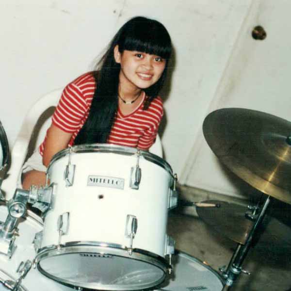 Shaira Luna playing drums