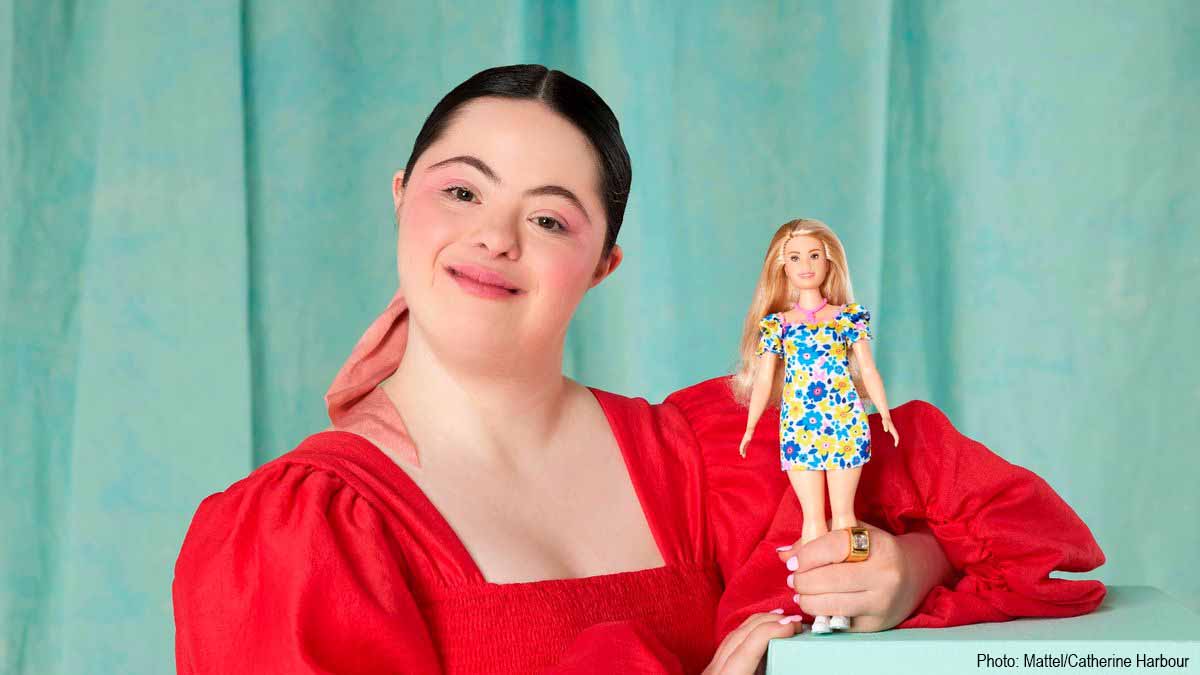 Photo of a model with Barbie doll with Down syndrome