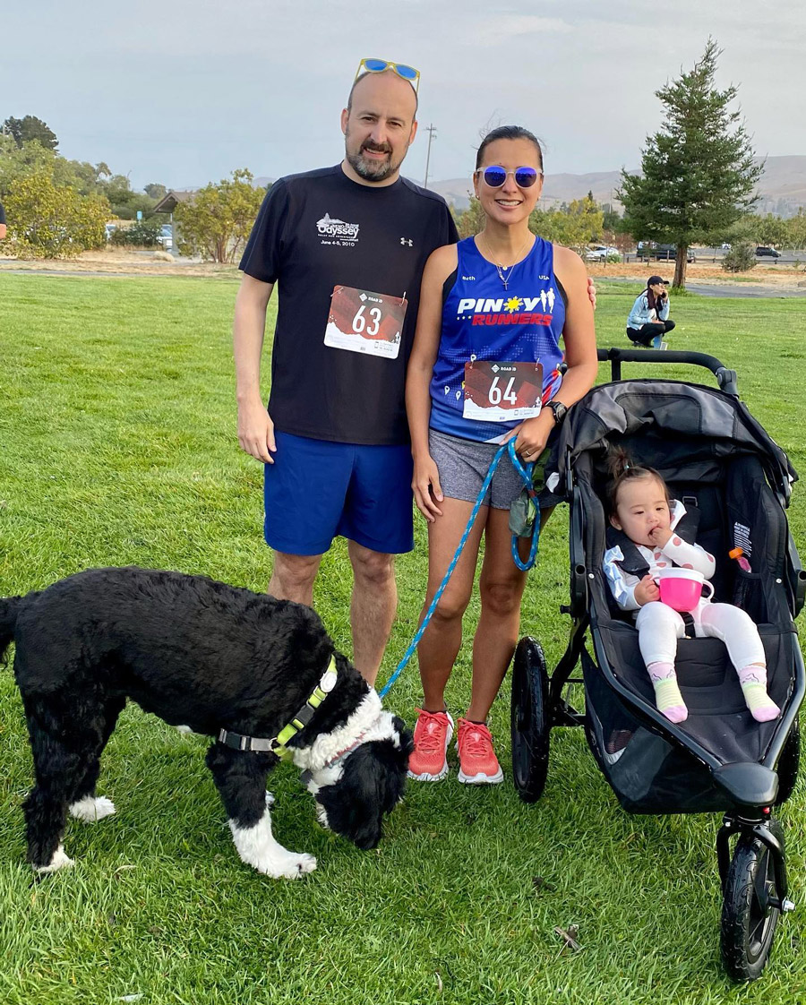 Beth Tamayo with husband Adam Hutchinson and daughter Sloane Isabelle at their family’s first 5K run.